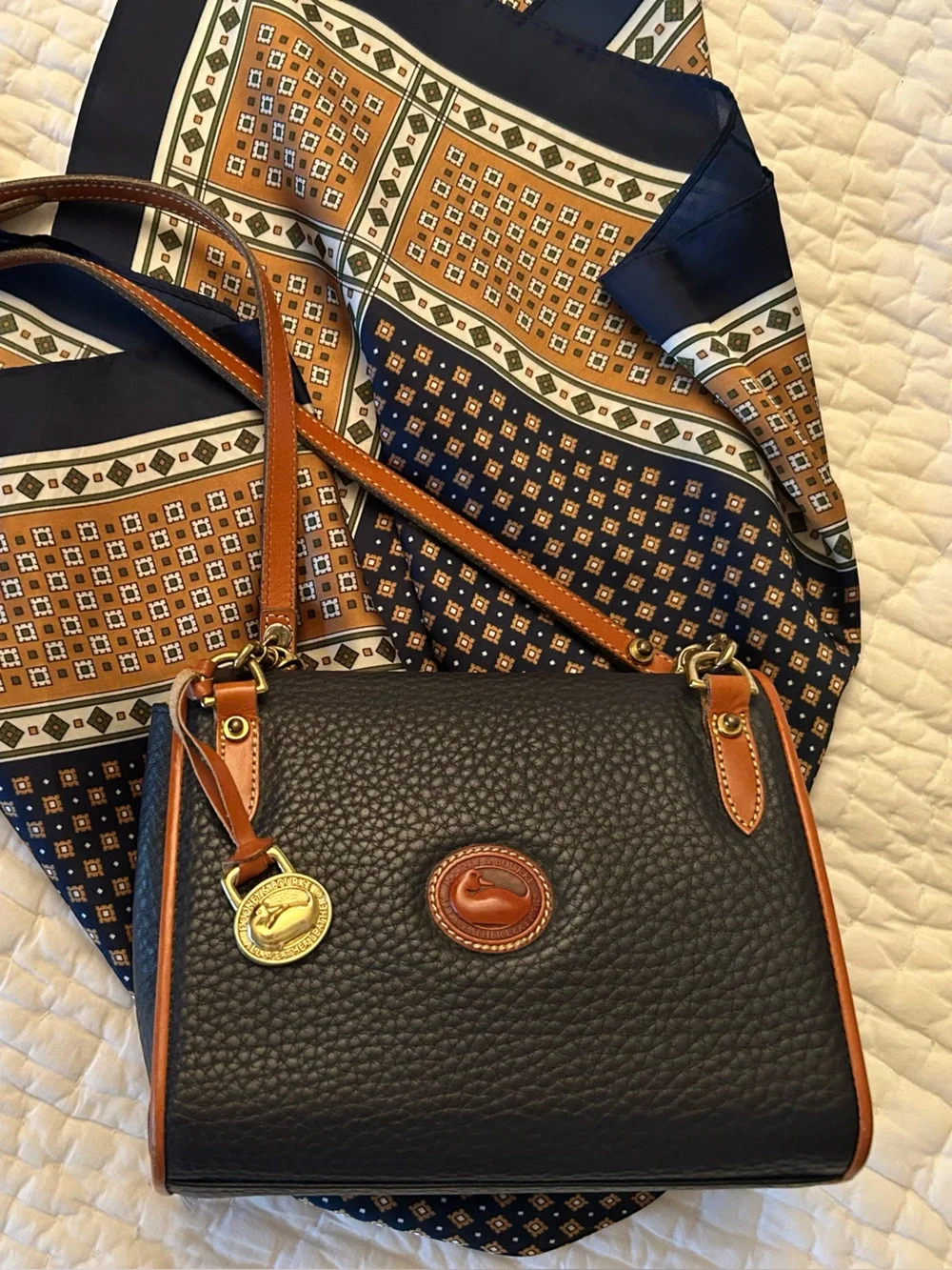 Structured Navy Dooney&Bourke Crossbody Bag with Tan Trim and Gold Accent